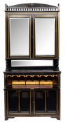 A late 19th Century Aesthetic Movement ebonised and gilt decorated secretaire bookcase: the upper