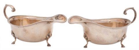 A pair of Elizabeth II silver sauceboats, maker Adie Brothers, Birmingham,