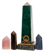 A malachite and gilt metal mounted obelisk: on a square marble base 22cm high,