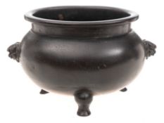 A small Chinese silver wire-inlaid bronze tripod censer: of globular form with waisted neck and