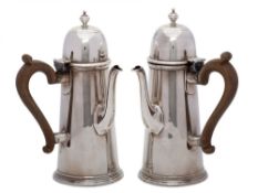 A pair of Edward VII silver café au lait pots, maker Wakely & Wheeler, London,