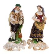 A matched pair of Bloor Derby figures of musicians: wearing brightly coloured costume,