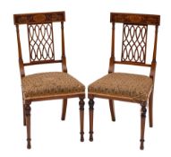 A pair of Edwardian mahogany and marquetry dining chairs:, bordered with boxwood lines,