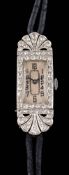 WITHDRAWN A lady's Art Deco platinum and diamond cocktail wristwatch: the rectangular dial