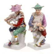 A pair of Continental figures of jester musicians in Cozzi style: one playing bagpipes in the form