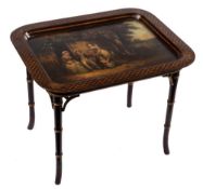 A Victorian papier mache tray: decorated with a scene of 'The Sailors Return' by a follower of