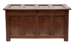 An 18th Century oak rectangular coffer:, of moulded panel construction,