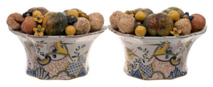 A pair of French faience trompe l'oeil wall pockets: in Moustiers style,