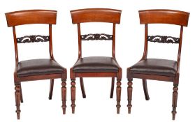 A set of six Victorian carved mahogany dining chairs:,