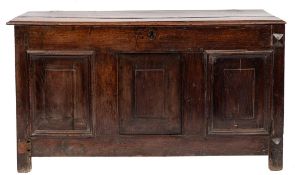 An 18th Century oak rectangular coffer:, with a plain hinged moulded top,