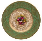 A Royal Worcester porcelain cabinet plate: the centre painted by Walter Austin with exotic garden