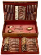 A German silver gilt flatware service, stamped marks: crested, includes twenty four dessert forks,