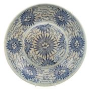 A Korean blue and white dish: painted with stylised flowers and foliage, 23.