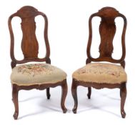 A pair of 19th Century Swedish carved walnut side chairs:,