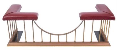 A brass and leather club fender:, having turned uprights,