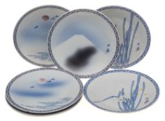 A set of six Japanese porcelain plates: painted with irises,