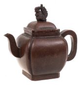 A Chinese Yixing stoneware teapot: of dark brown burnished finish and of canted square profile,