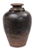 A large Vietnamese stoneware storage jar: of oviform with raised flaring neck,