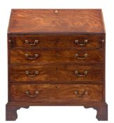 A George III mahogany bureau:,