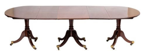 A Regency and later mahogany D-end triple pillar dining table:, the top with a reeded edge,