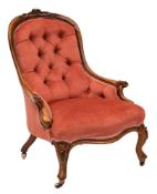 A lady's Victorian carved walnut armchair:,