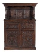 A carved oak court cupboard:,