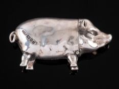 An Elizabeth II silver vesta case, maker David A Bowles, London, 1990: in the form of a pig, 6.