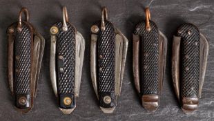 A group of five WWII Regulation Royal Navy pocket knives: one with MOD crows foot dated 1940,