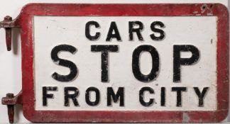 A cast aluminum double sided tram sign 'Cars Stop From City': black and white with red border and