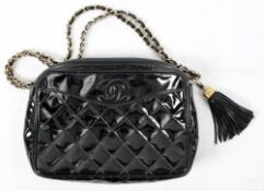 A Vintage 1986-88 Chanel black patent leather quilted evening bag: with 'CC' logo above front