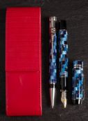 A Parker Duofold pen set: comprising fountain pen and biro in blue check pattern,