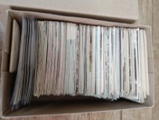 Box of old postcards, including submarines,