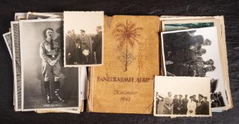 A WWII German 'Panzerarmee Afrika Kalender 1943': in worn condition, part filled,