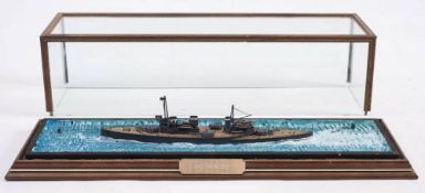 A cased waterline model HMS Invincible: with detailed decks on a painted base within a glazed case ,