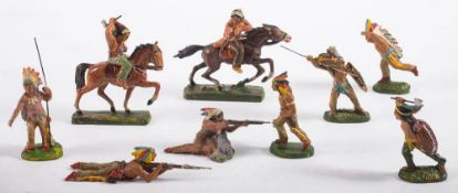 A group of Elastolin Wild West Indianer range figures:, comprising two riders on horseback,