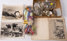 A collection of various cap badges and related militaria: Tank Regiment, Devonshire Regiment ,