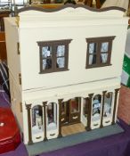 A 20th Century doll's hat shop 'Lucille' in cream and brown with fixtures and fittings.