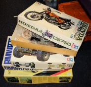 A collection of various empty Tamiya model kit boxes: containing modelling parts etc.
