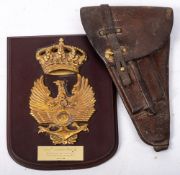 A brown leather pistol holster: possibly for a Walther PPK,