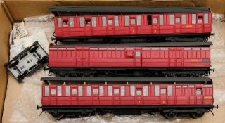 A group of six kit built O gauge LMS passenger coaches: including First & Guard,