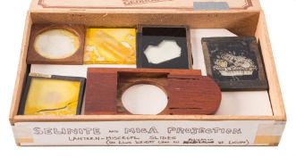 A collection of mica polarization lantern slides, reputedly used by Professor Henry Drummond,
