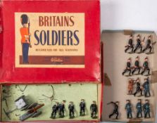 A part set of Britains No 79 'Landing Party with Gun': comprising four naval ratings,