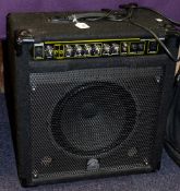 A White Horse BP80 Bass amplifier: in a black felt covered case.