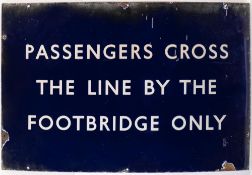 A BR(E) enamel station sign 'Passengers Cross The Line By The Footbridge Only': 61 x 91cm (damaged)