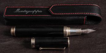 A Montegrappa 1912 fountain pen: in black iridescent finish with silver mount,
