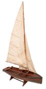 A scale model fishing boat: fully rigged over simulated plank deck and plank and pinned hull,