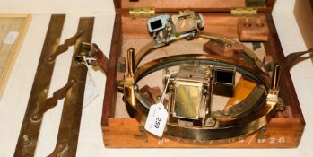 An Admiralty pattern azimuth circle in wooden case: one other azimuth circle,