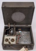 A Burndept Portable Model 241 'Attache' radio: in a grey simulated crocodile skin suitcase style