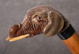 An Edwardian silver mounted carved elephant head walking cane, maker Robert Pringle,