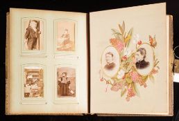 An Edwardian Musical Cabinet photograph album: playing 'Auld lang syne' with floral lithographed